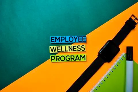 Employee Wellness Program text on top view color table background. Stock Photos