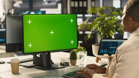Employee at work using isolated screen PC display to finish project tasks Stock Photos