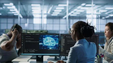 Employee working with AI machine learning algorithms Stock Photos