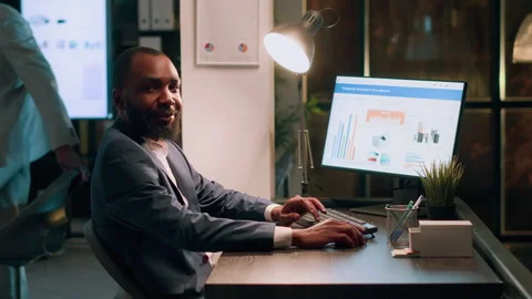 Employee working on payroll reports Stock Footage 246832905