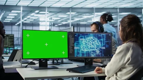 Employee works on green screen computer in server hub, using AI to process data Stock Footage 319246895