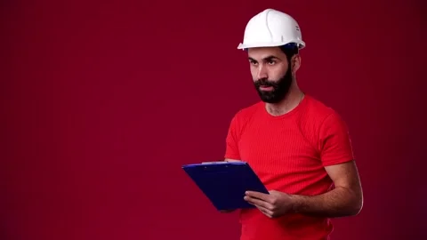 Employee writes data to a folder Stock Footage 165621613