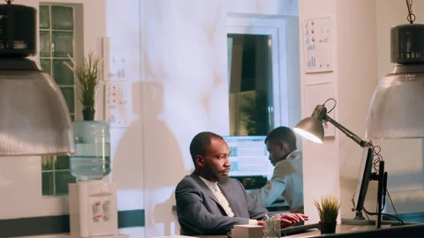 Employees analysing data charts Stock Footage 246832549
