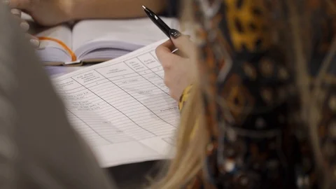 Employees are making notes in a notepad Stock Footage 89138028