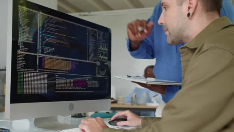 Employees Coding on Computer at Startup Office Stock Footage 277412132
