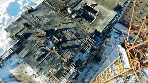 Employees doing construction works on a building in progress Video stock 128307626