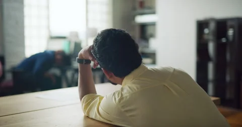 Employees getting tired and falling asleep at their desks in modern well lit off Stock Footage 199460722