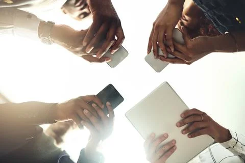 Employees, hands and tech in workplace circle, campaign project and research Stock Photos