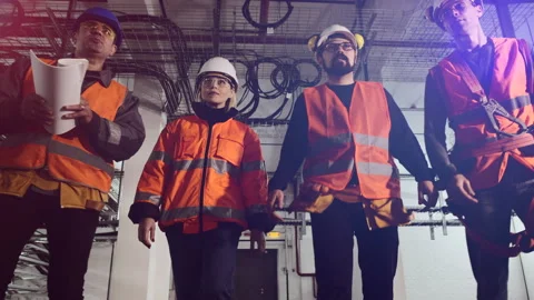 Employees with papers walk checking power plant premises Video stock 143670161