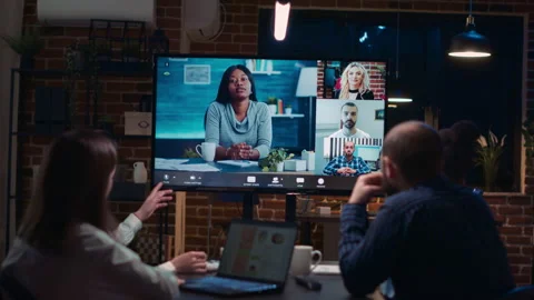Employees planning strategy with remote team in teleconference app Video stock 231847889