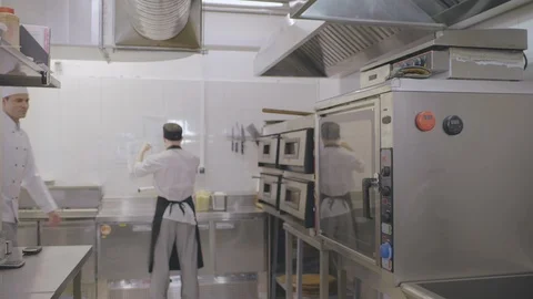 Employees of restaurant kitchen working. Stock Footage 125049374