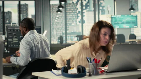 Employees reviewing data visualization to meet project objectives Stock Footage 320741713