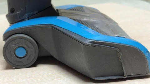 Empowered Vacuum Ignites With a Thundering Whir and Fades to a Satisfying Click Stock Footage 328797997