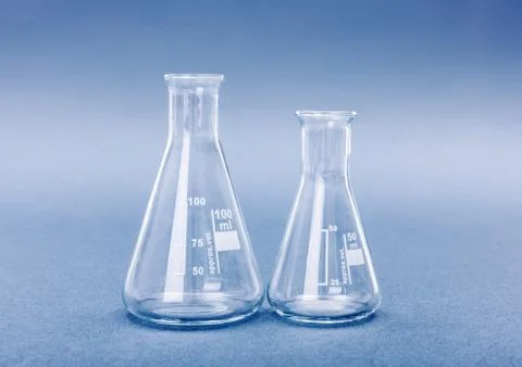 Empty 50 and 100 milliliter Erlenmeyer chemistry flasks Stock Photos