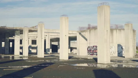 Empty, abandoned construction site with concrete pillars. Stock Footage 142673720