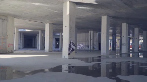 Empty, abandoned construction site with concrete pillars, interior. Stock Footage 142674090