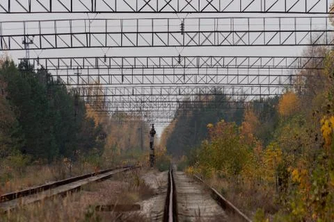 Empty abandoned train tracks leading into the distant vanishing point in Prip Stock Photos
