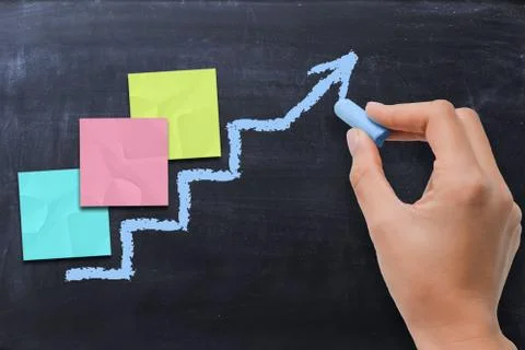 Empty adhesive notes on chalk drawn ladder Stock-Fotos