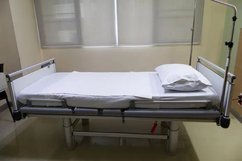 Empty adjustable patient bed 写真素材