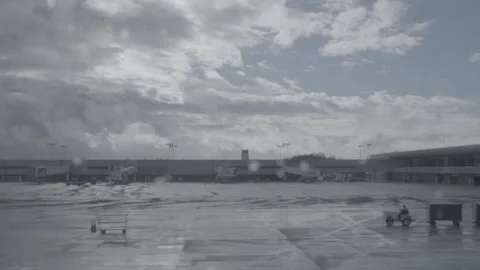 Empty Airport Apron and Gates on Rainy Day Stock Footage 343939600