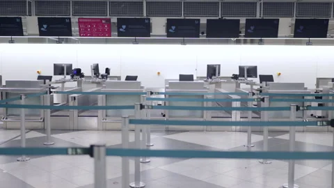 An Empty Airport Checkin Area featuring Digital Displays and Minimalist Interior Stock Footage 312177067