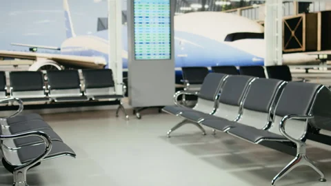 Empty airport terminal interior with modern seating and large windows Stock Footage 339644535