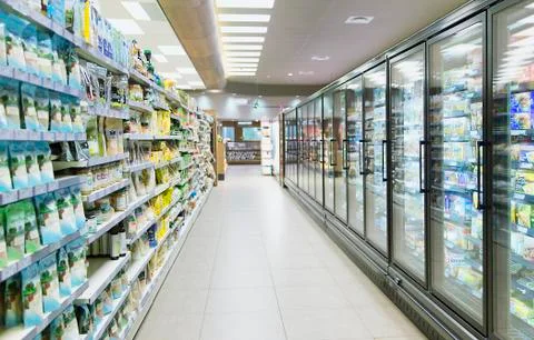 Empty aisle in grocery store Stock Photos