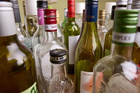 Empty Alcohol Bottles Collection Close-Up View Stock Photos
