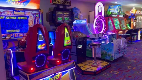 Empty amusement arcade featuring several different types of arcade games 01 Stock Footage 333166539