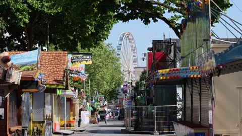 Empty amusement park street before opening Stock Footage 336096242