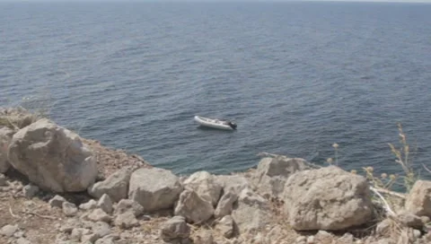 Empty anchored boat Stock Footage 8695219