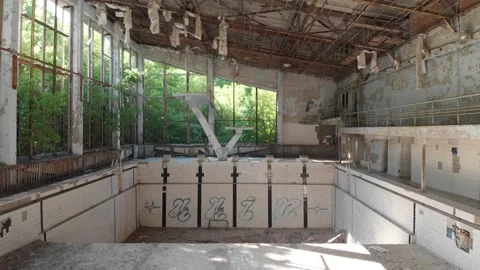 Empty and abandoned swimming pool in the city of pripyat Stock Footage 194429375