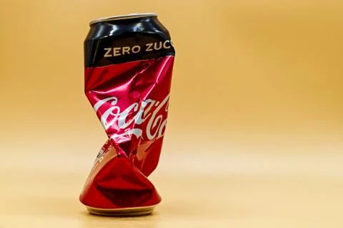 Empty and crushed Coca Cola can Stock Photos