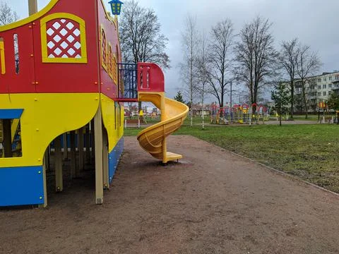 Empty and deserted playground on a cloudy day Stock Photos