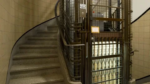 Empty Antique Elevator In An Old Building Going Down. static shot Stock Footage 150772256