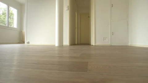 Empty apartment with white walls and wood floor Stock Footage 340990077