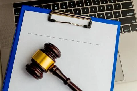 An empty application form of document and wooden gavel isolated. Stock Photos