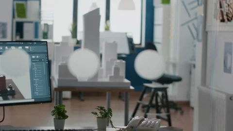 Empty architectural workplace with building model and 3d construction layout on Vídeos de archivo 166423090