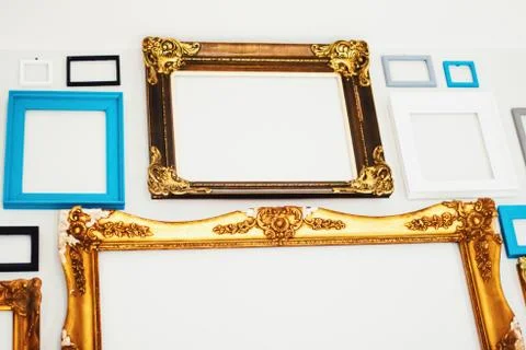Empty art frames on gallery wall, decor and design Stock Photos