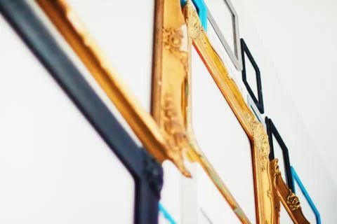 Empty art frames on gallery wall, decor and design Stock Photos