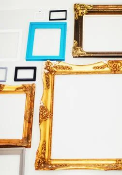 Empty art frames on gallery wall, decor and design Stock Photos