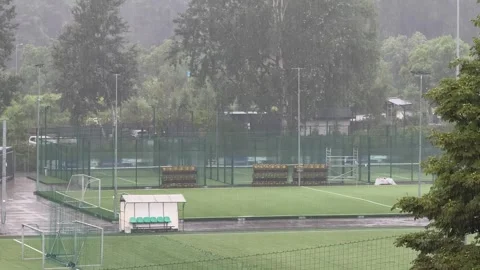 Empty Artificial Turf Sports Fields During Heavy Rain Stock Footage 340512526