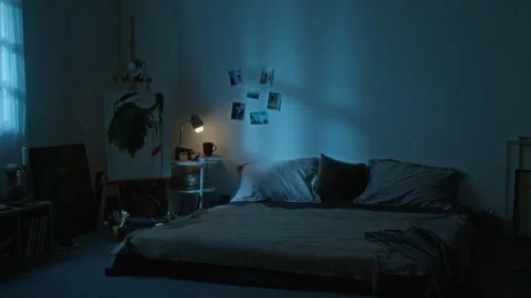 Empty Artist Studio Bedroom Illuminated by Dim Lamp at Night Stock Footage 345223087