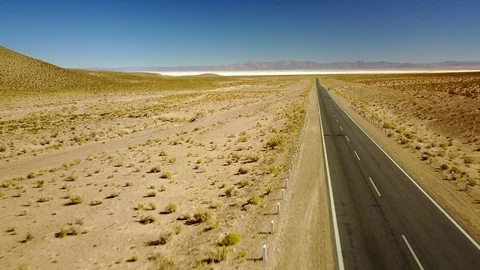 Empty asphalt highway on arid landscape AERIAL Stock Footage 88513928