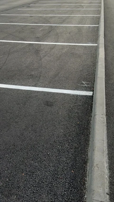 Empty asphalt parking lot with white painted lines Stock-Footage 338111452