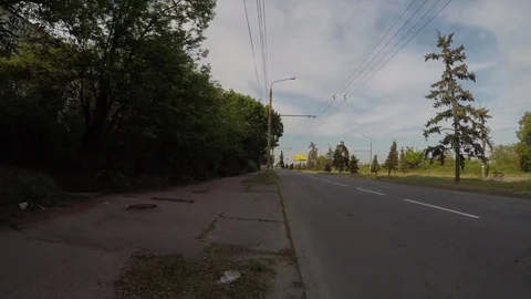 Empty asphalt road against the background of trees Stock Footage 130168724