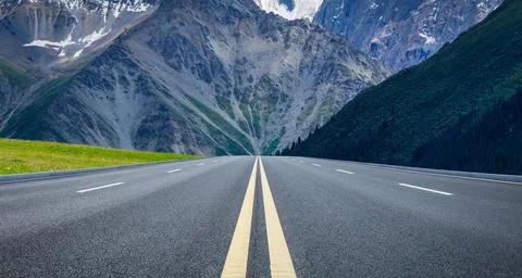 Empty asphalt road and mountain nature background. Stock Photos