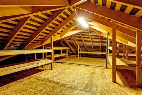 Empty attic with storage shelves Stock Photos