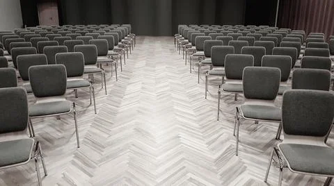 Empty auditorium with grey chairs Stock Photos