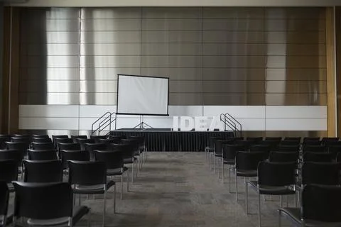 Empty auditorium with Idea letters on stage Stock Photos